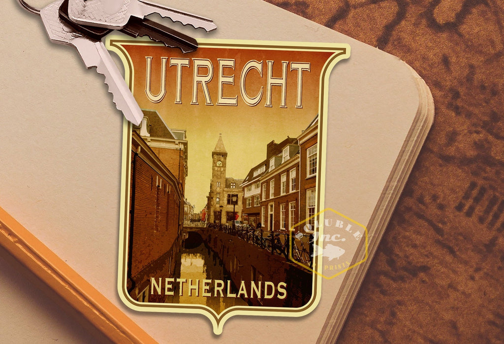 May include: A vintage-style travel poster featuring a canal scene in Utrecht, Netherlands. The poster has a brown and yellow color scheme and features a tall church tower in the background.